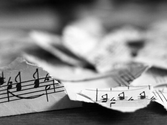 Torn musical notes, pieces of paper